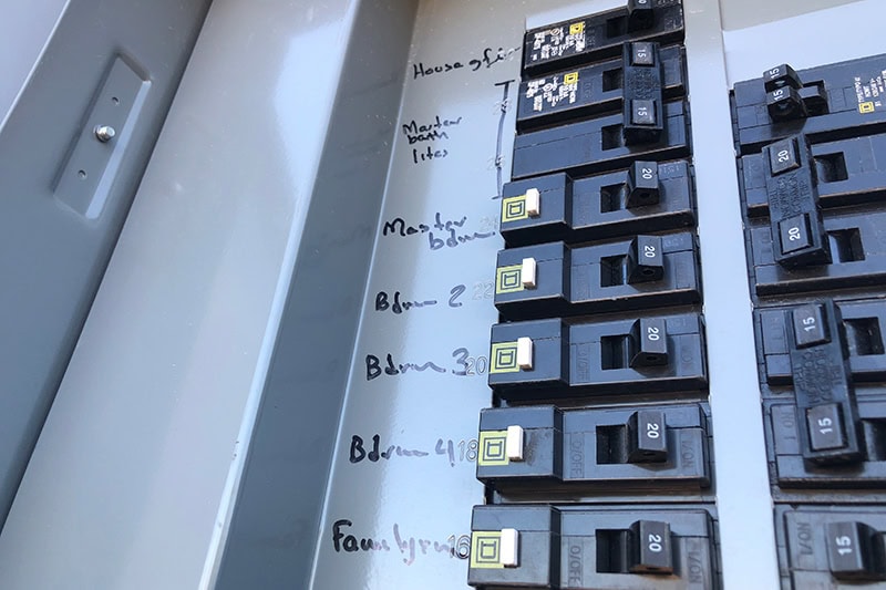 5 Reasons to Upgrade Your Electrical Panel. Photo of an electrical breaker.