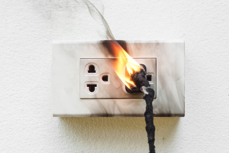 An outlet on fire.